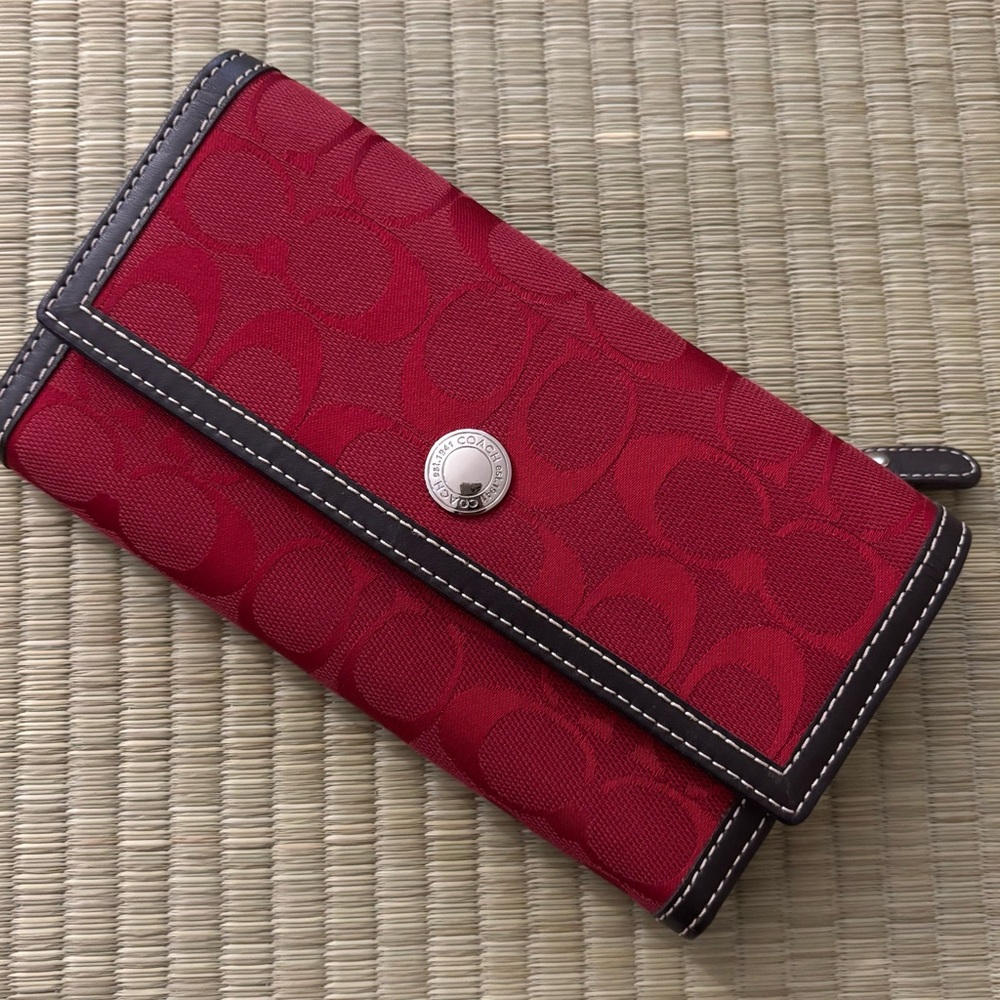 Coach signature clutch trifold wallet.